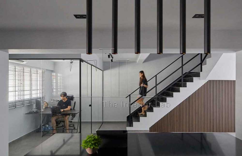 Contemporary Home Office with Staircase and Glass Door