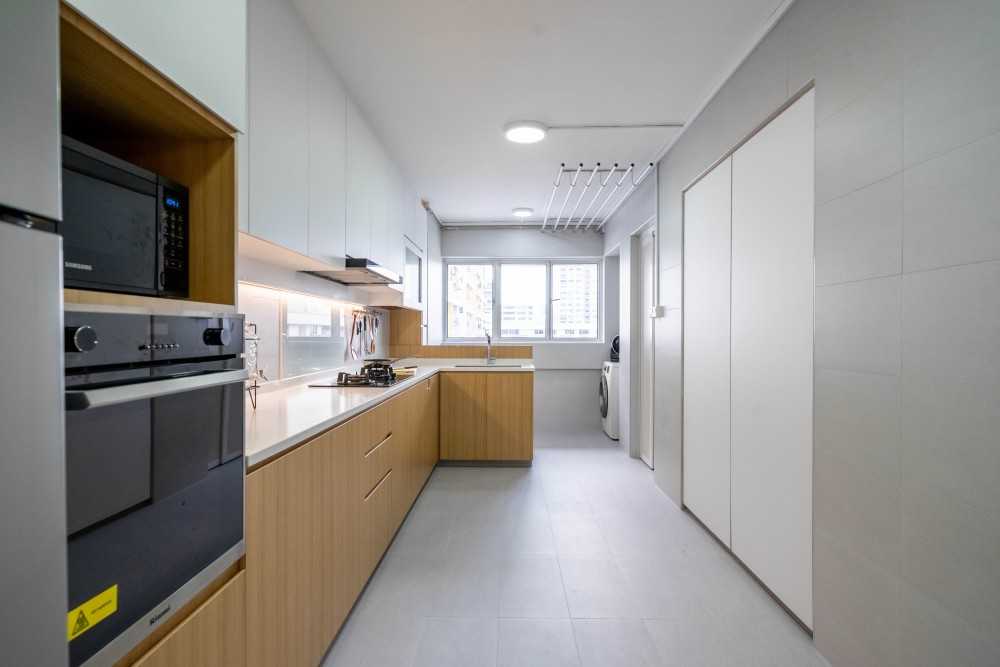 Scandinavian Kitchen with Herringbone Tiling and Kitchen Window