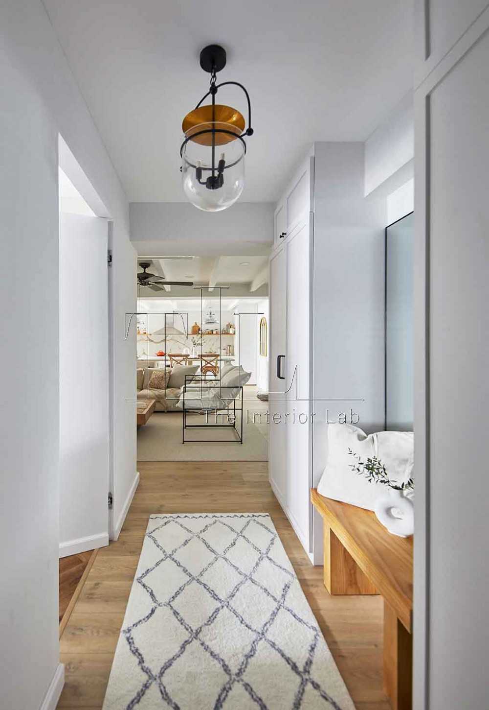 Country Entryway with Parquet Floor and Mirror