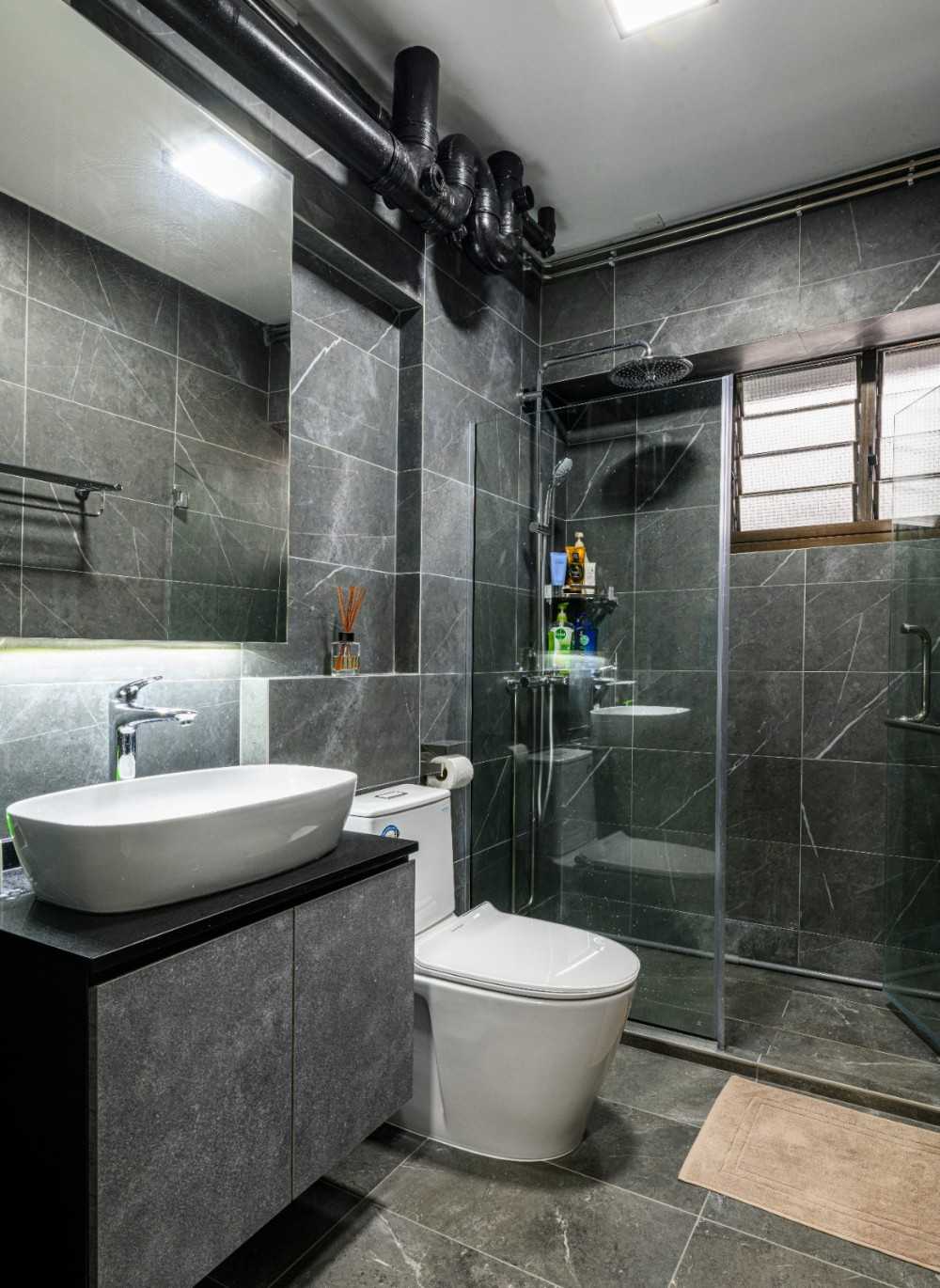 Industrial Bathroom with Marble Floor and Mirror