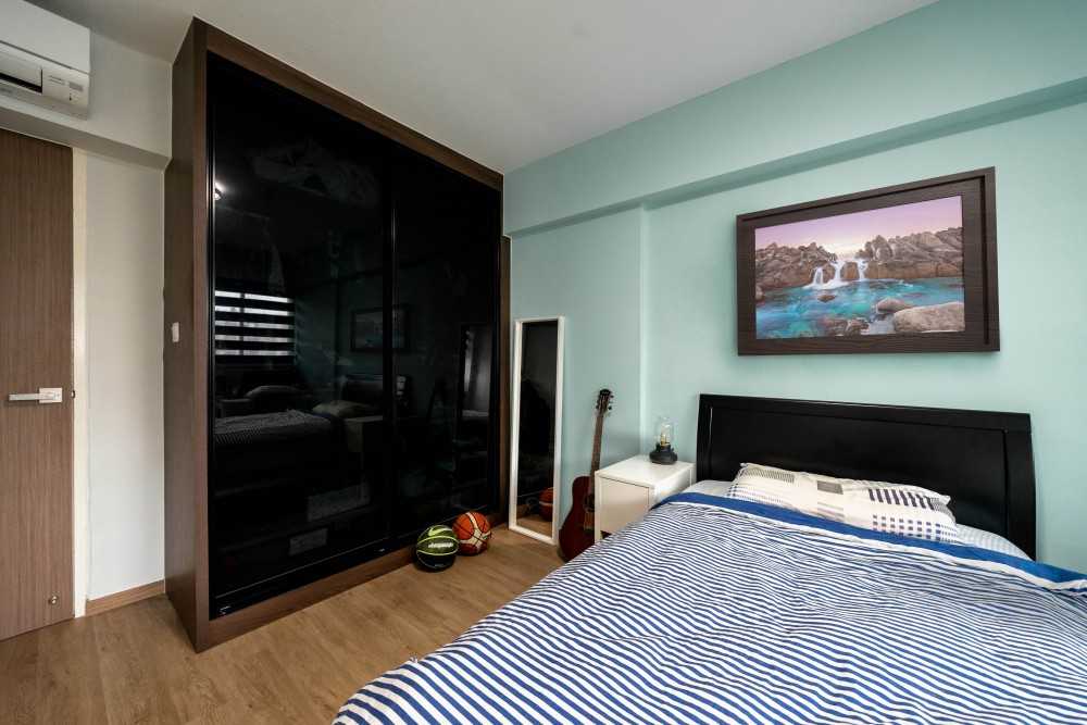 Contemporary Bedroom with Bedside Table and Children's Beds