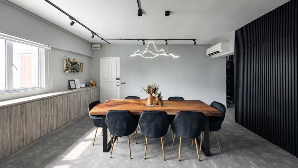 Industrial Dining Room with Cement Floor and Feature Wall