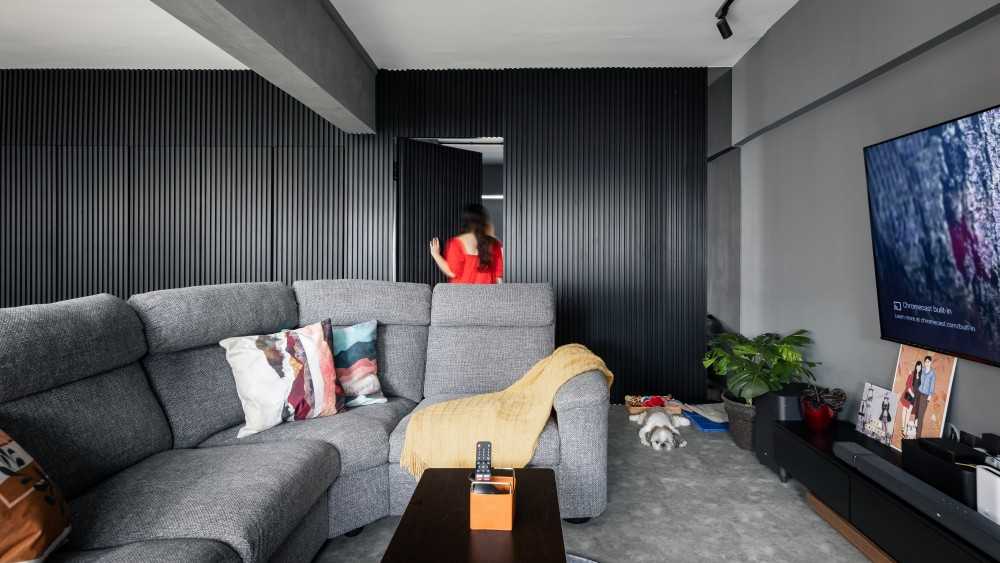 Industrial Living Room with Cement Floor and TV Console