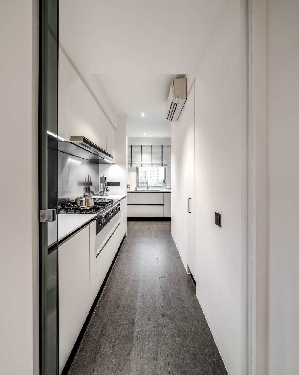 Minimalist Kitchen with Kitchen Cabinets and Flooring