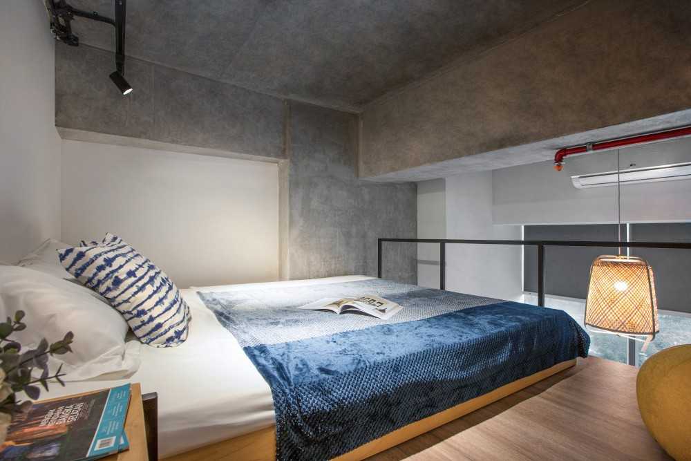 Industrial Bedroom with Bookshelf and Platform Bed