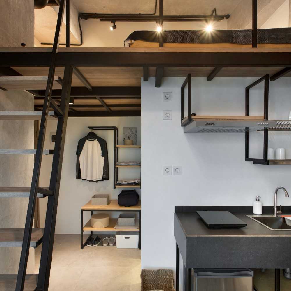Industrial Kitchen with Countertop and Wood Flooring