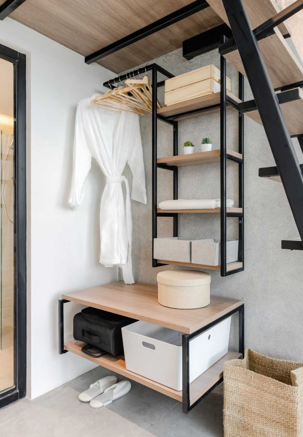 Industrial Studio with Bookshelf and Side Table