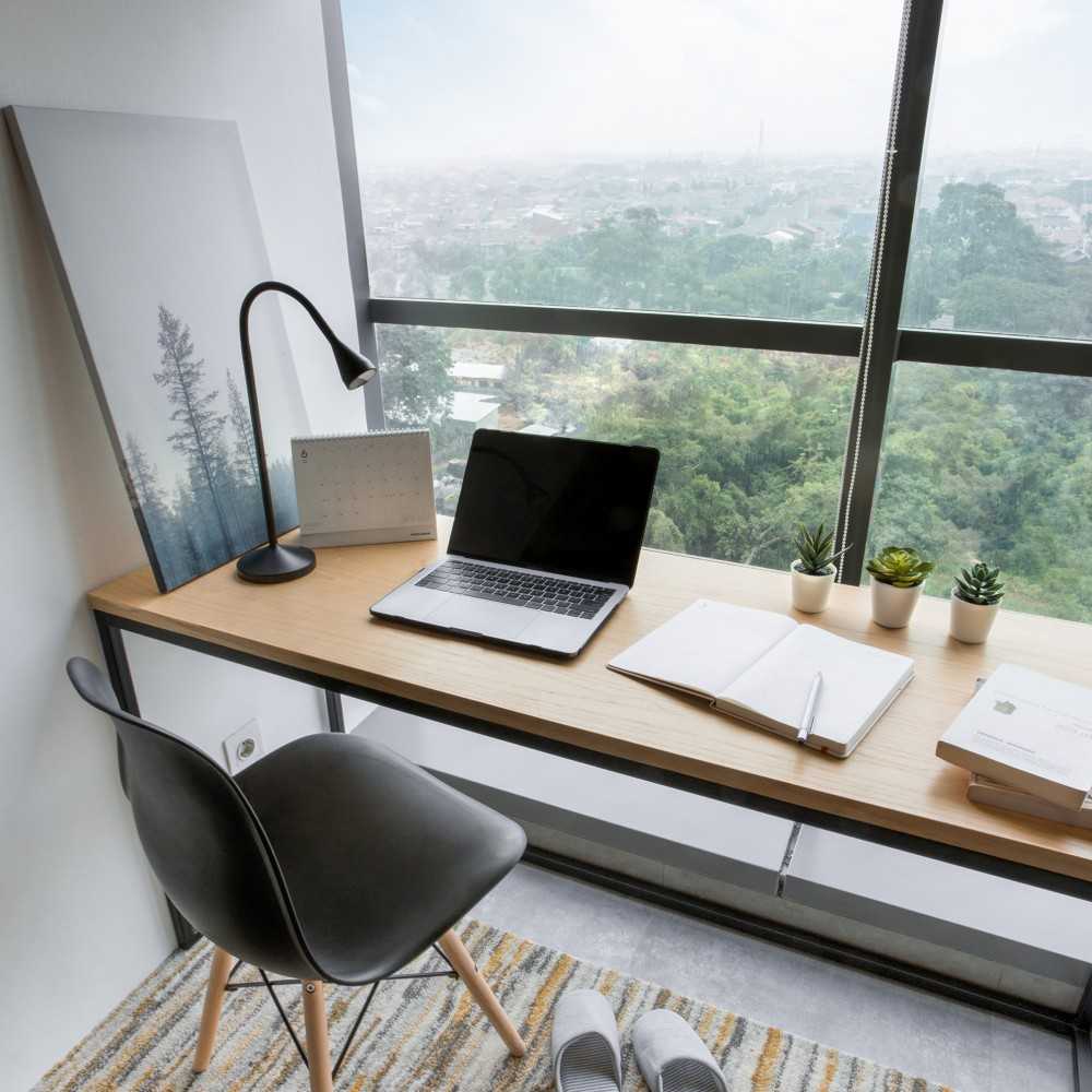 Industrial Bedroom with Desk and Desk Chairs