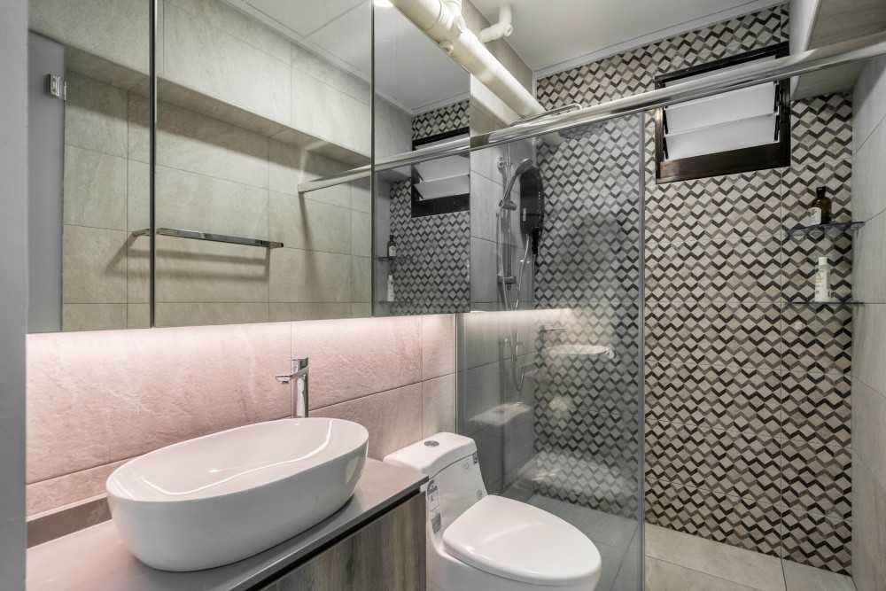 Contemporary Bathroom with Herringbone Tiling and Mirror