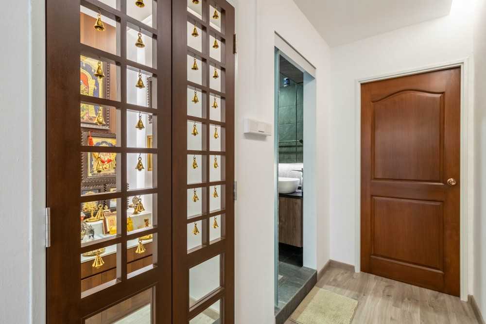 Contemporary Hallway with Bookshelf and Artwork