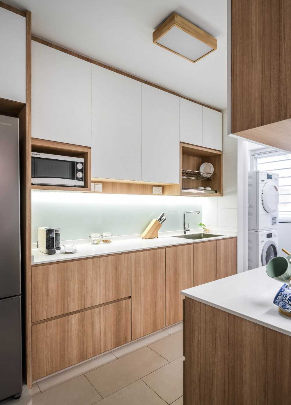 Scandinavian Kitchen with Countertop and Refrigerator