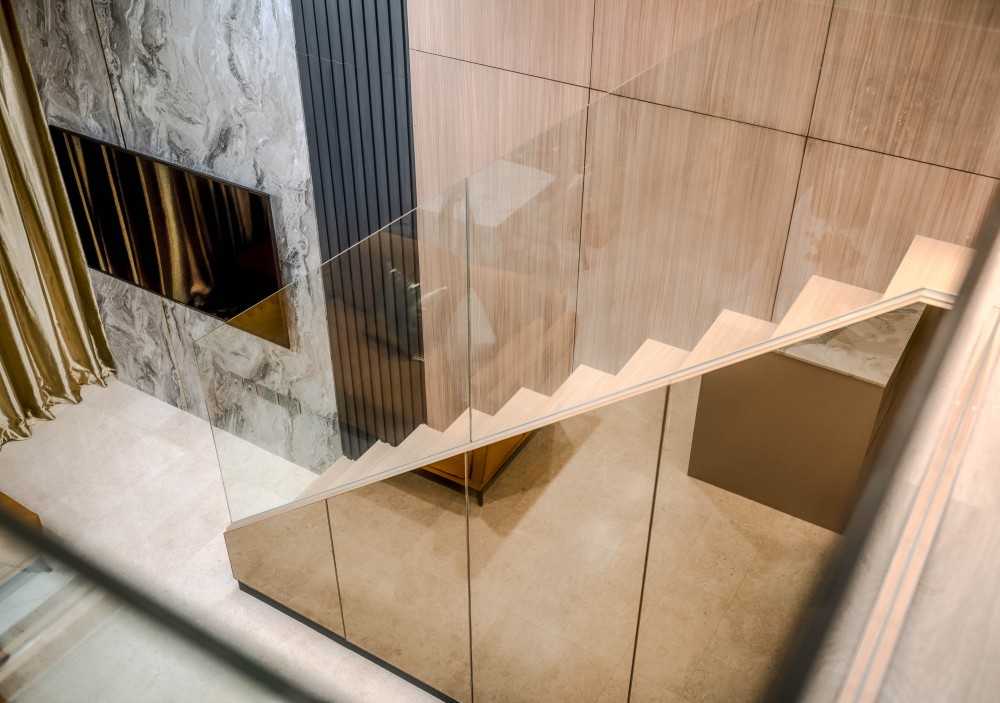 Modern Living Room with Vinyl Flooring and Staircase