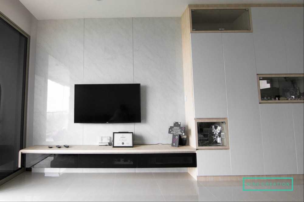Modern Living Room with Bookshelf and TV Console