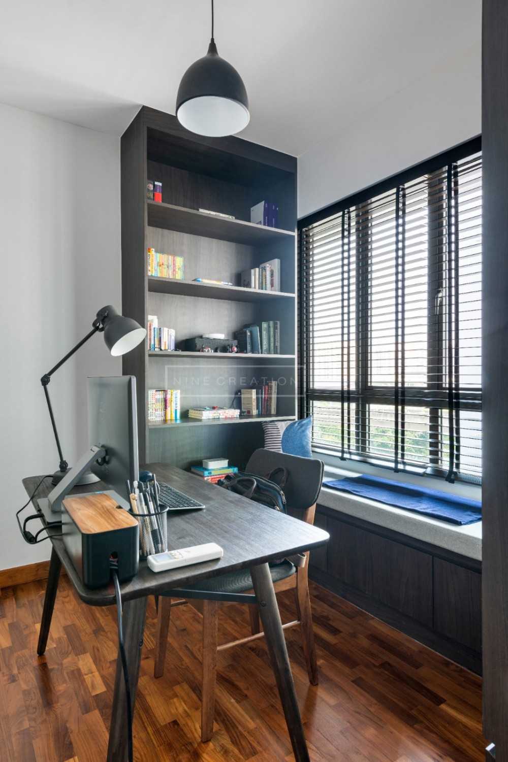 Modern Home Office with Bookshelf and Desk