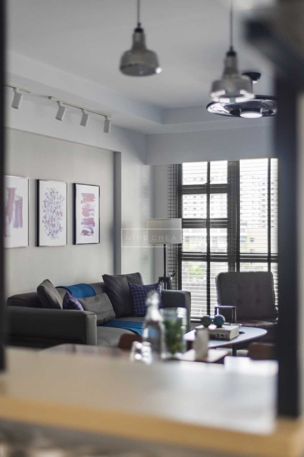 Modern Living Room with Ceiling Light and Roller Blinds