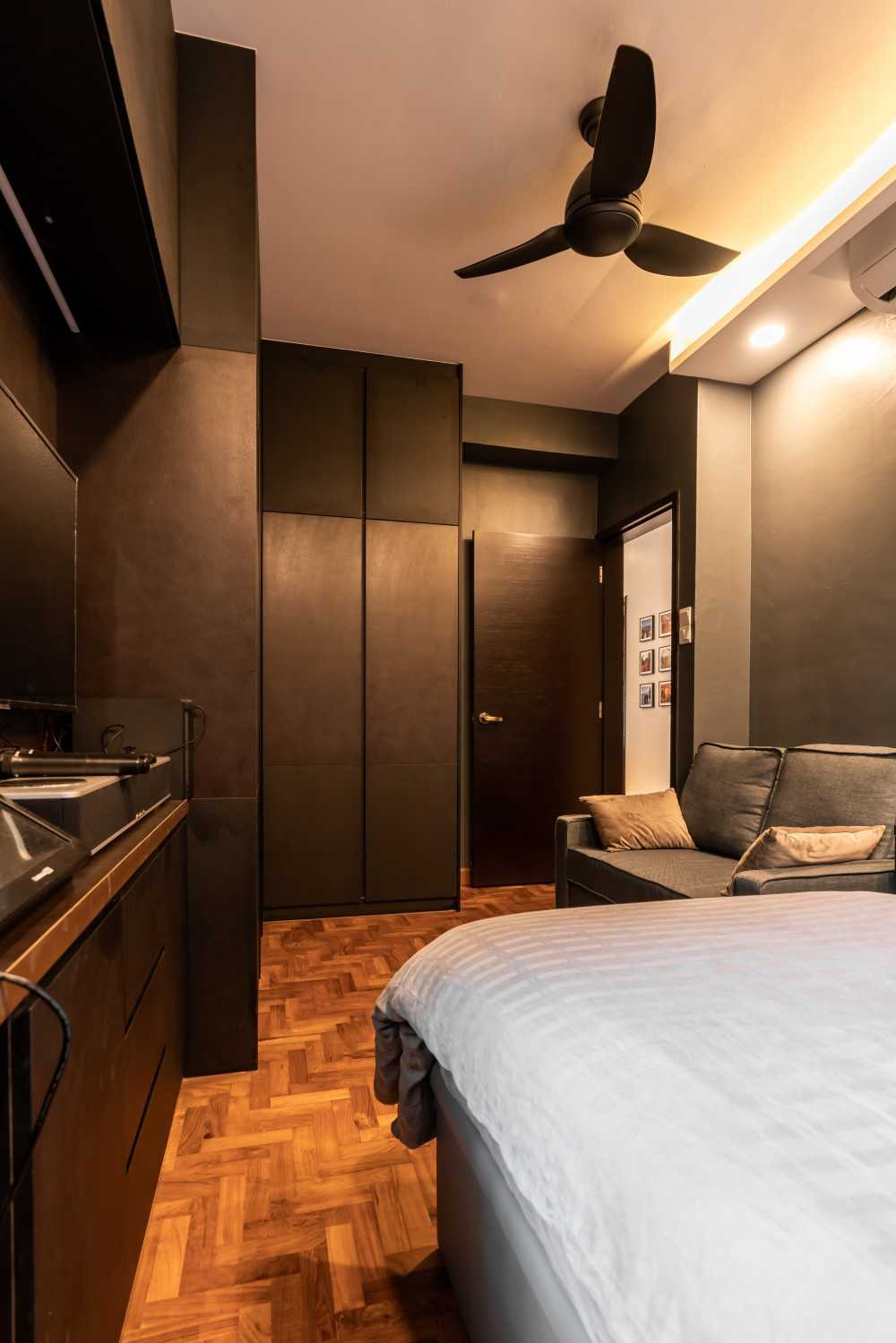 Asian Bedroom with Parquet Floor and TV Console