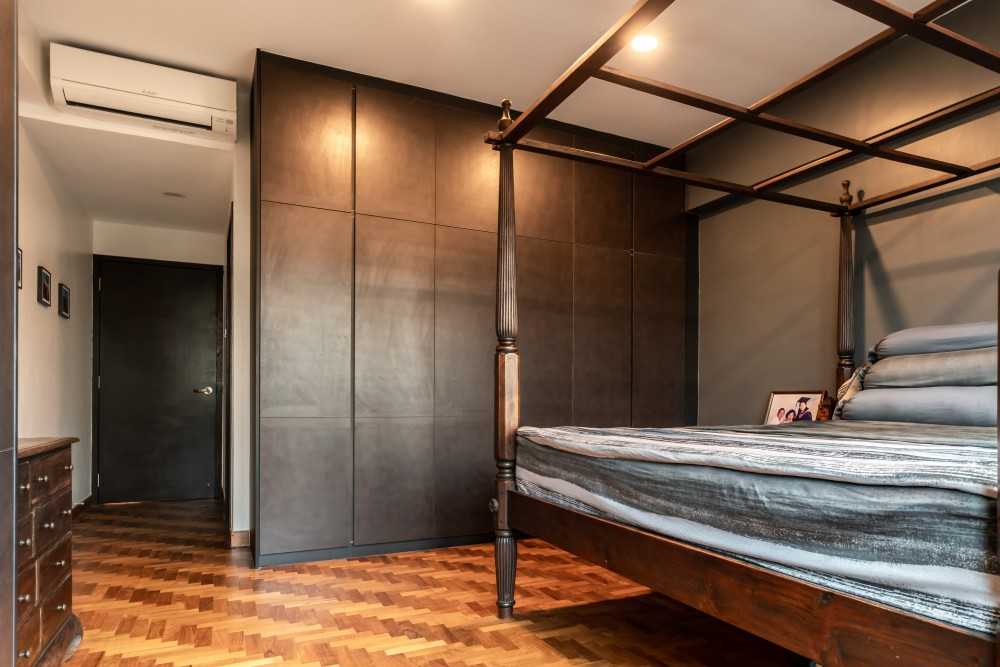 Asian Bedroom with Parquet Floor and Drop Light