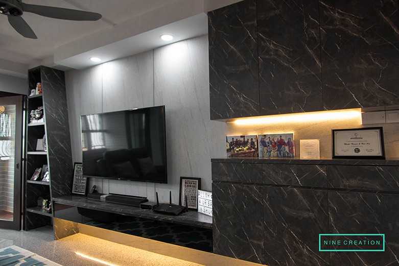 Asian Living Room with TV Console and Feature Wall