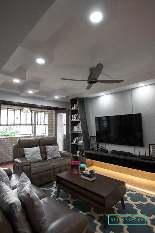 Asian Living Room with TV Console and Feature Wall