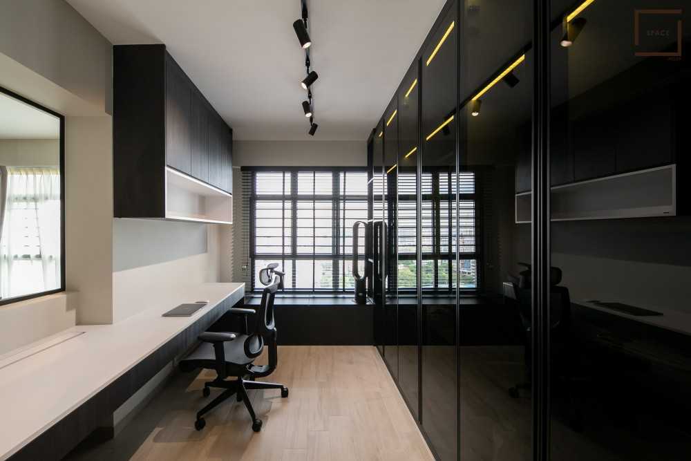 Modern Home Office with Bookshelf and Desk