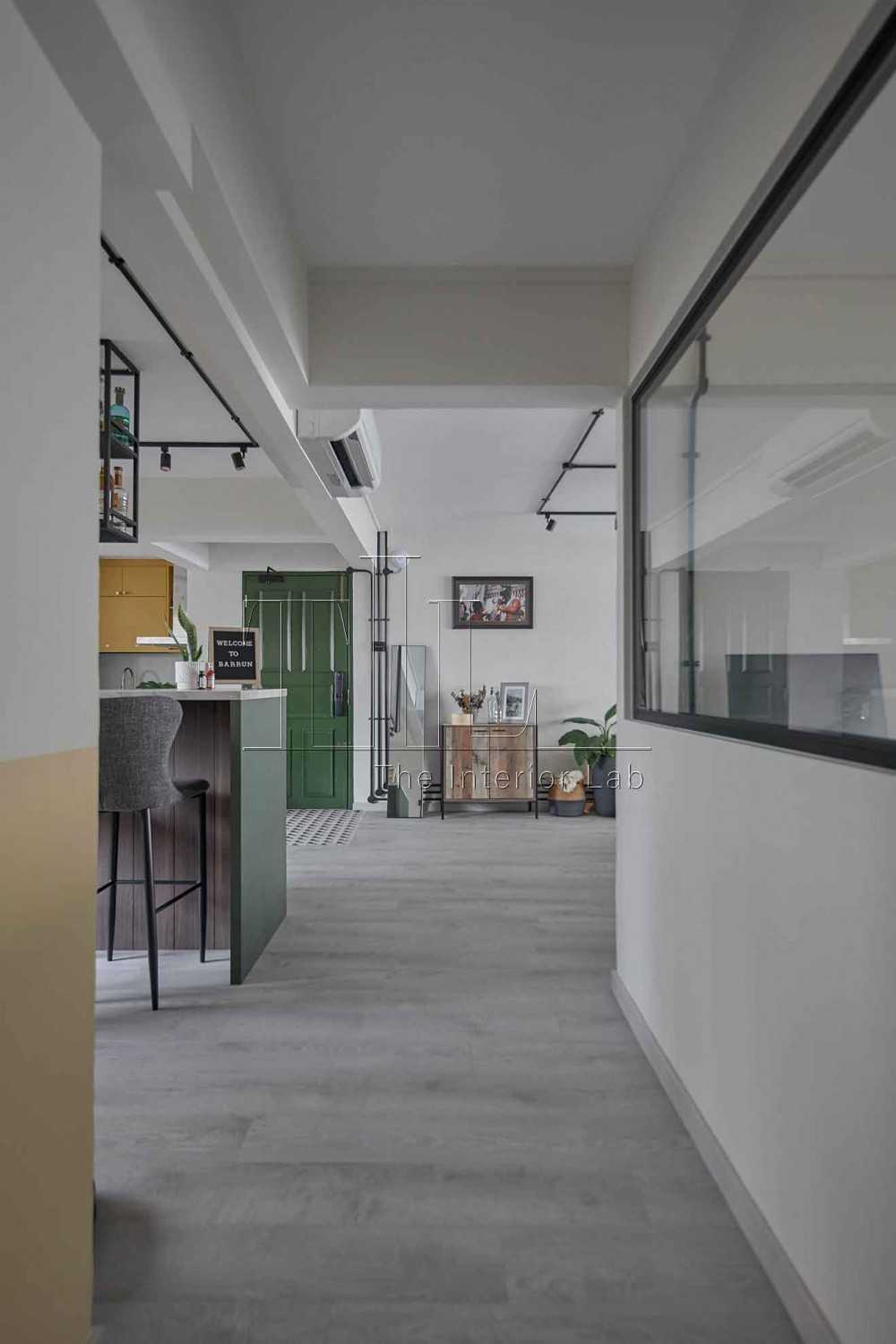 Eclectic Hallway with Artwork and Bar Stool