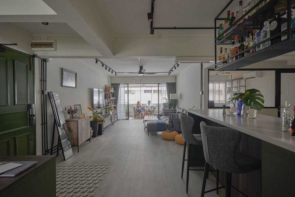 Eclectic Living Room with Bookshelf and TV Console