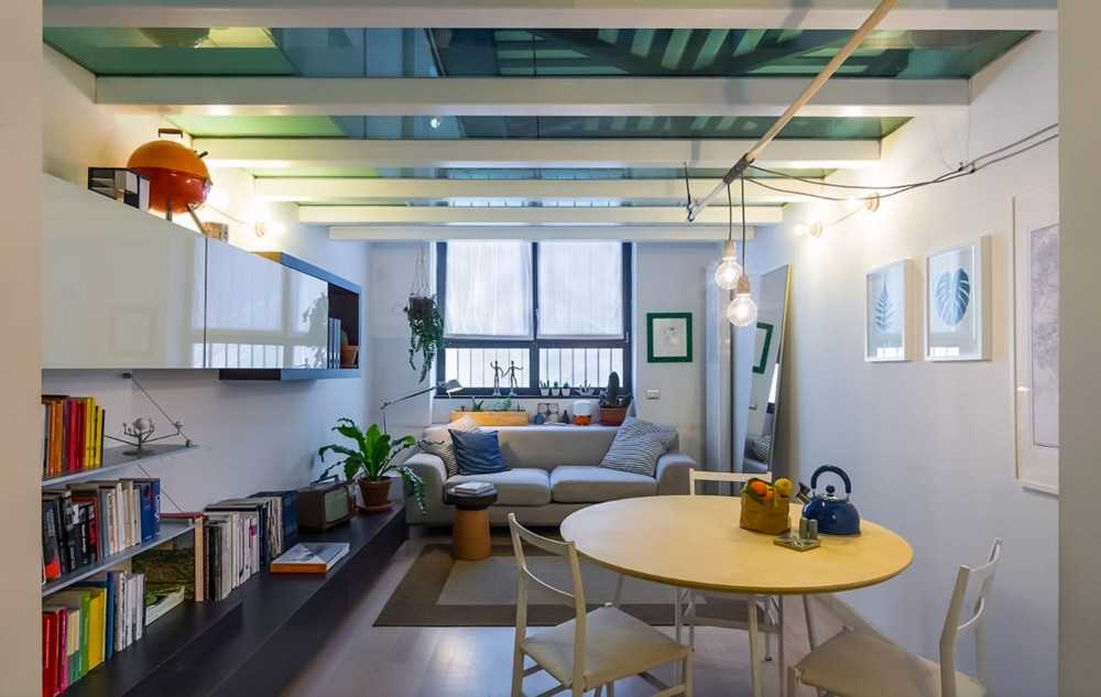 Contemporary Living Room with Bookshelf and Loft