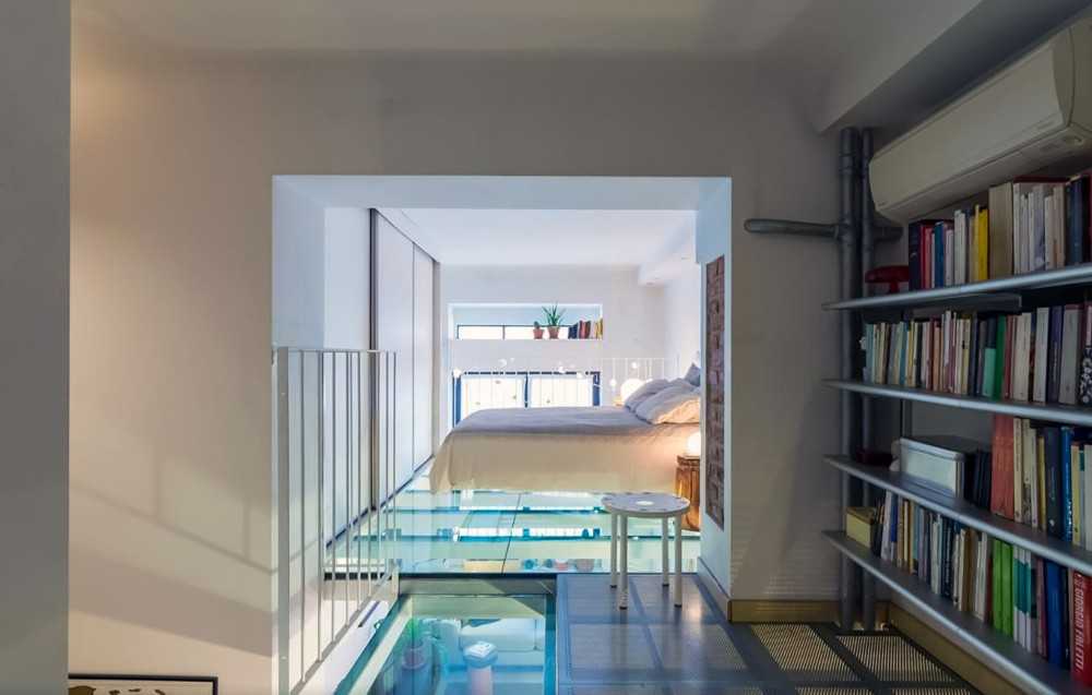 Contemporary Bedroom with TV Console and Loft