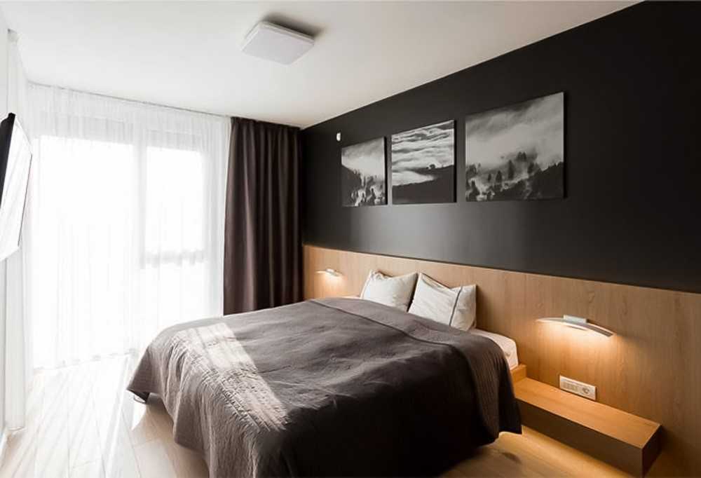 Contemporary Bedroom with Vinyl Flooring and Feature Wall