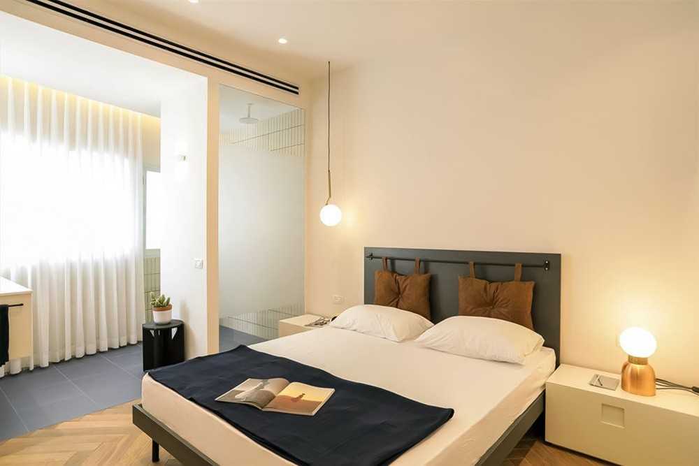 Contemporary Bedroom with Platform Bed and Vinyl Flooring