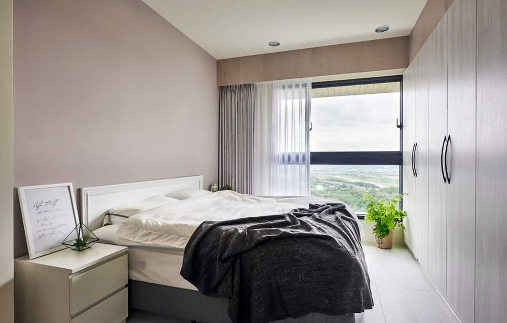 Contemporary Bedroom with Herringbone Tiling and Ceiling Light