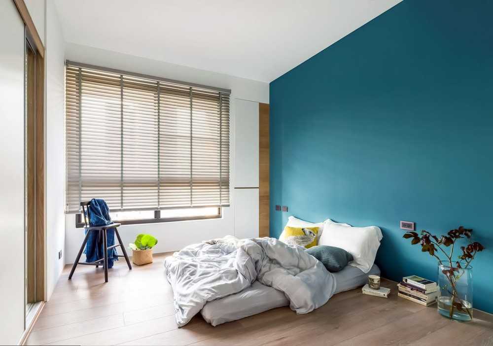 Contemporary Bedroom with Marble Floor and Drop Light