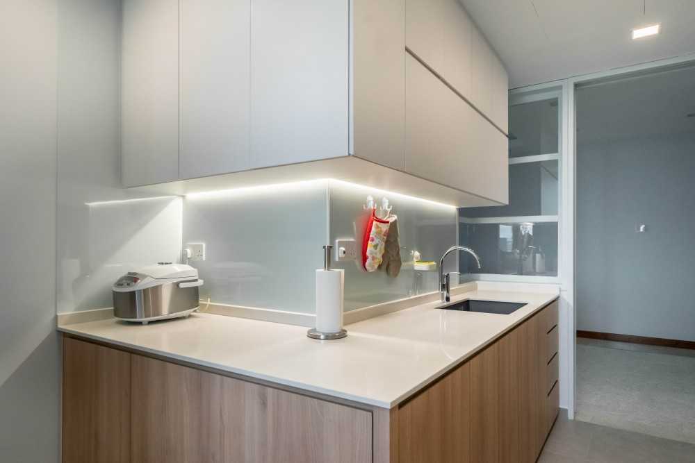 Contemporary Kitchen with Herringbone Tiling and Breakfast Counter