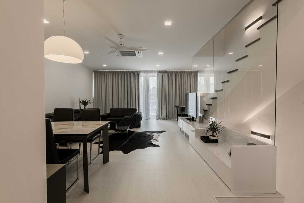 Minimalist Living Room with Herringbone Tiling and Cement Floor