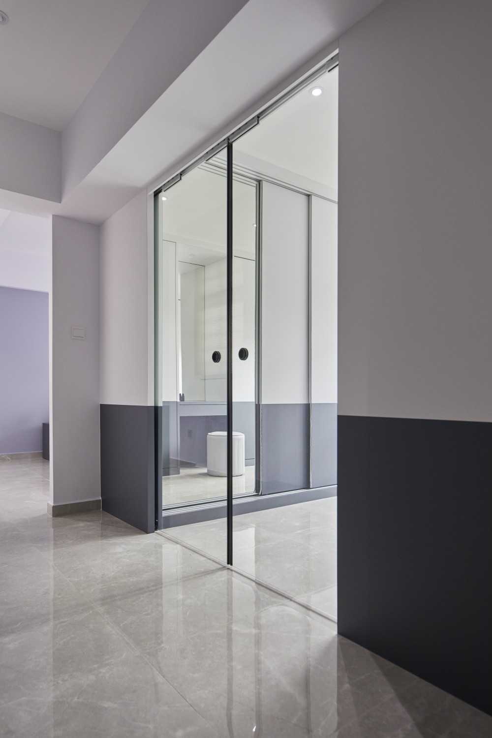 Contemporary Bedroom with Homogeneous Tiles and Glass Door