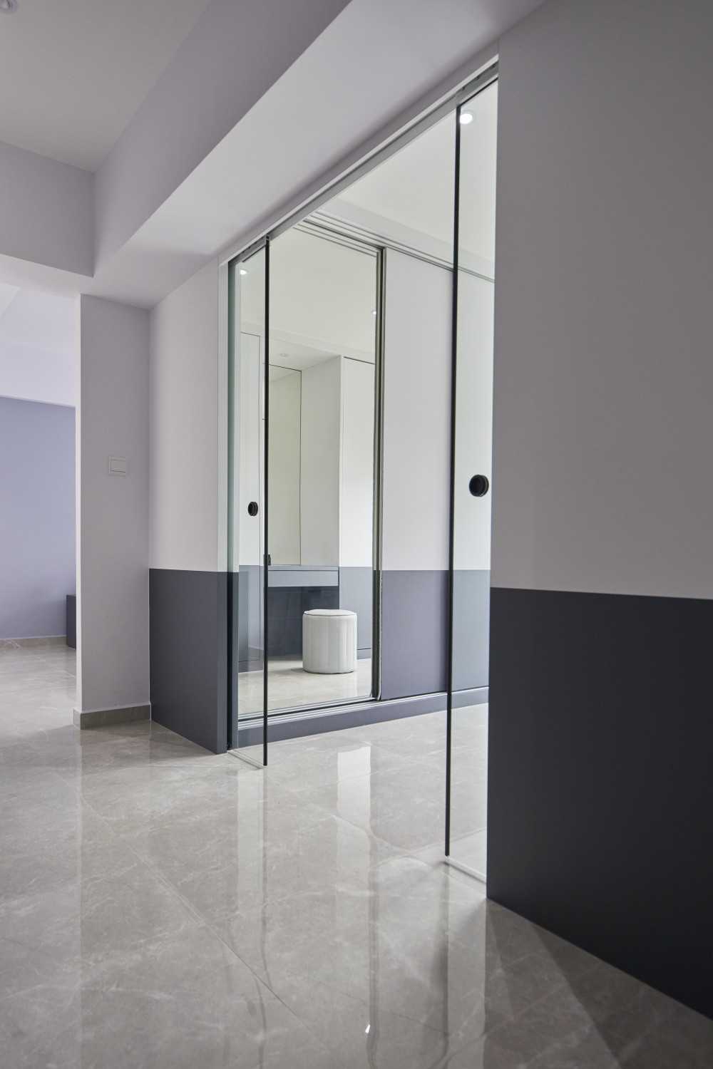 Contemporary Bedroom with Homogeneous Tiles and Glass Door