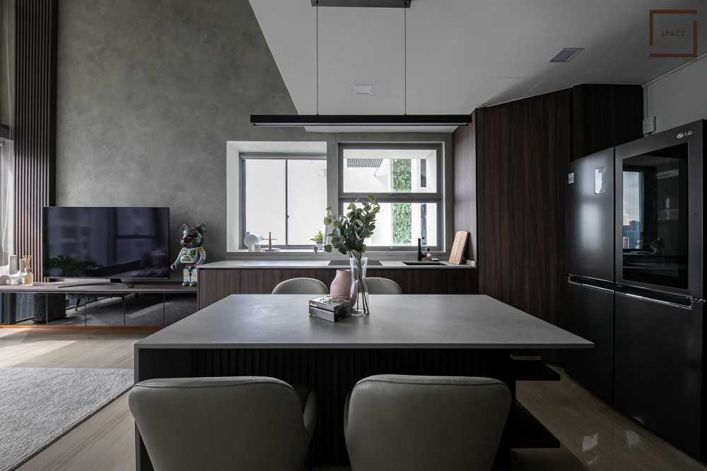 Contemporary Dining Room with Drop Light and Dining Table