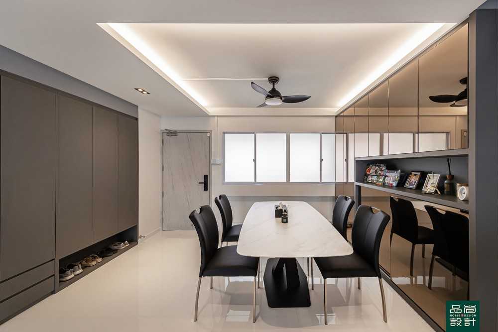Modern Dining Room with Mirror and Cove Lighting