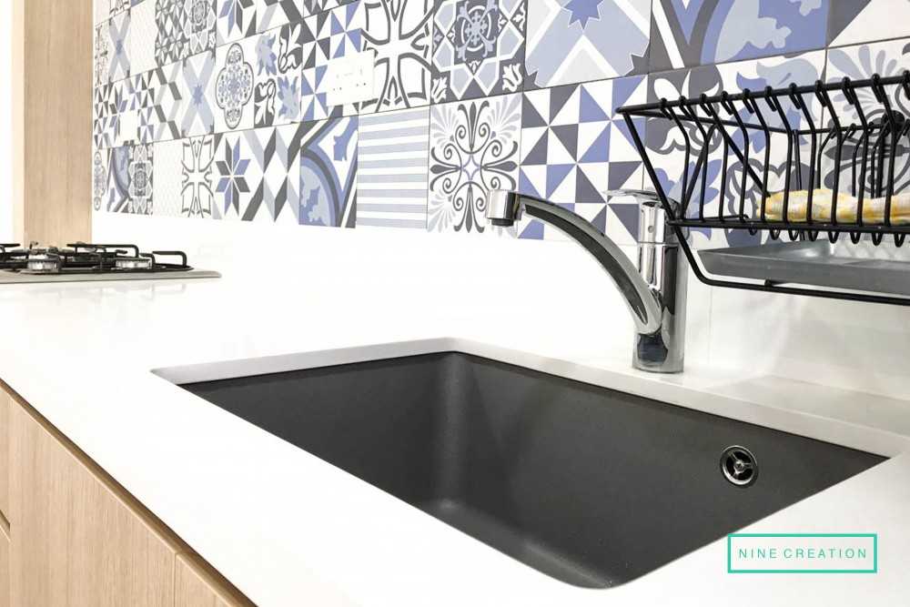 Scandinavian Kitchen with Countertop and Homogeneous Tiles