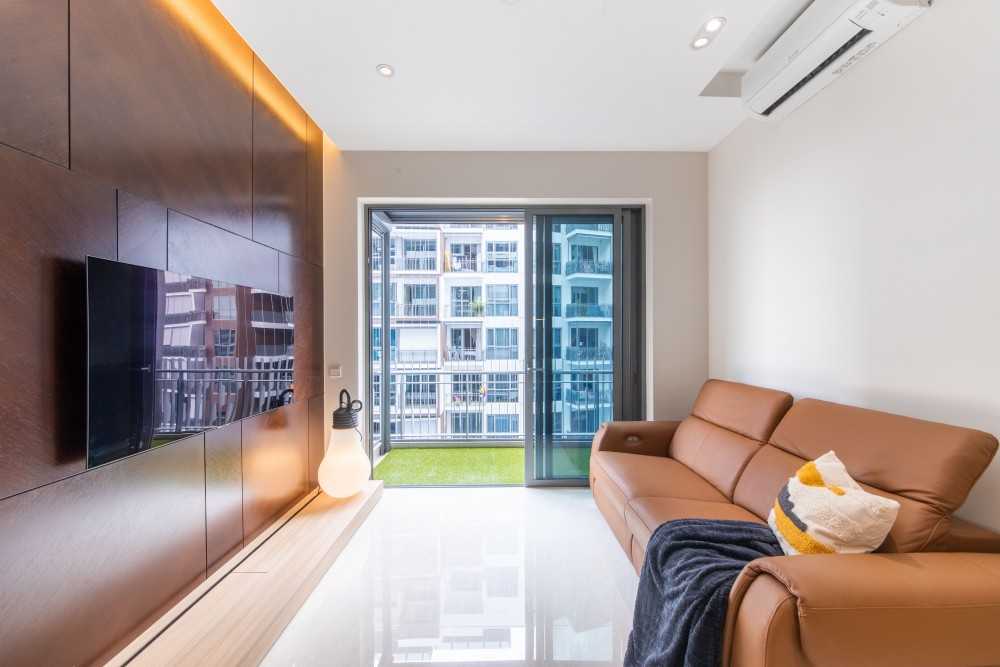 Contemporary Living Room with Marble Floor and Feature Wall