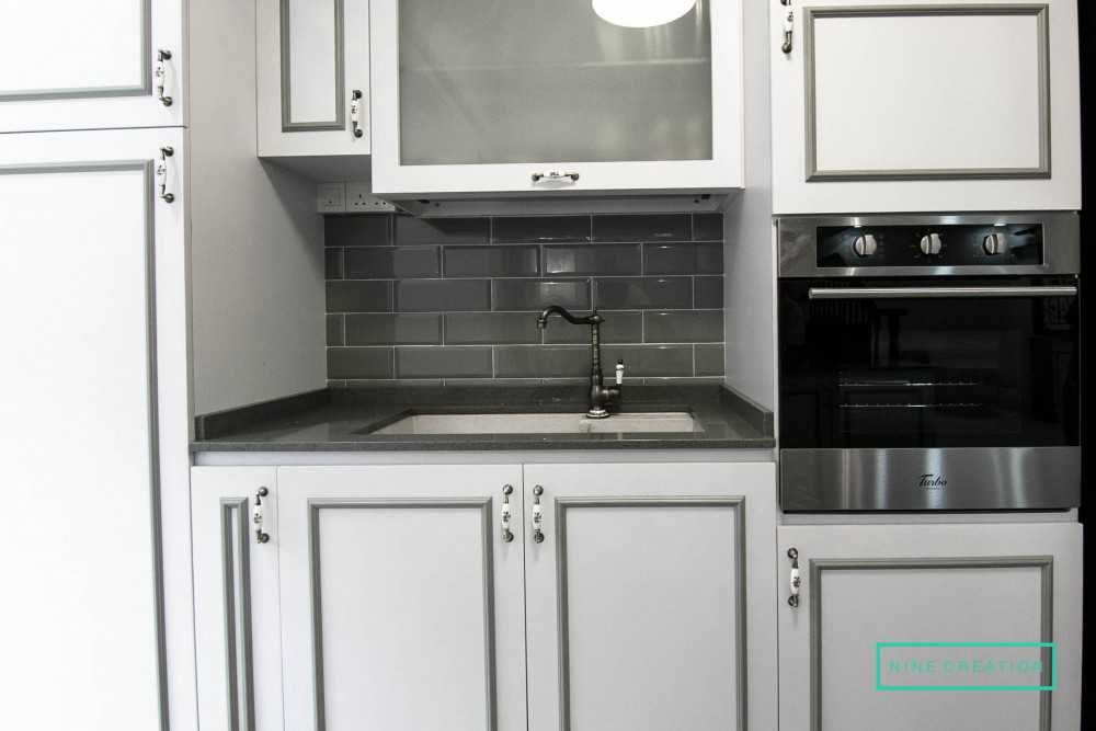 Vintage Kitchen with Countertop and Kitchen Backsplash