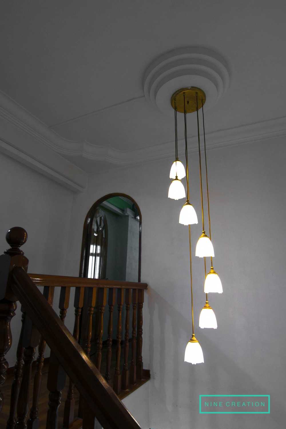 Vintage Hallway with Drop Light and Staircase
