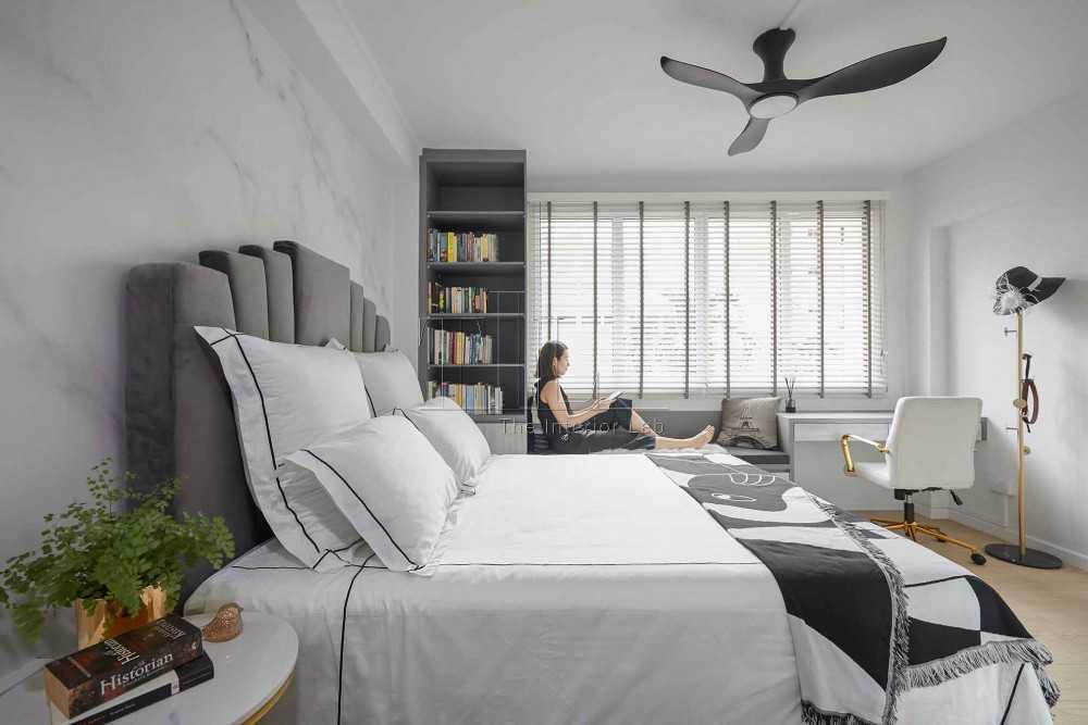 Contemporary Bedroom with Bookshelf and Wood Flooring