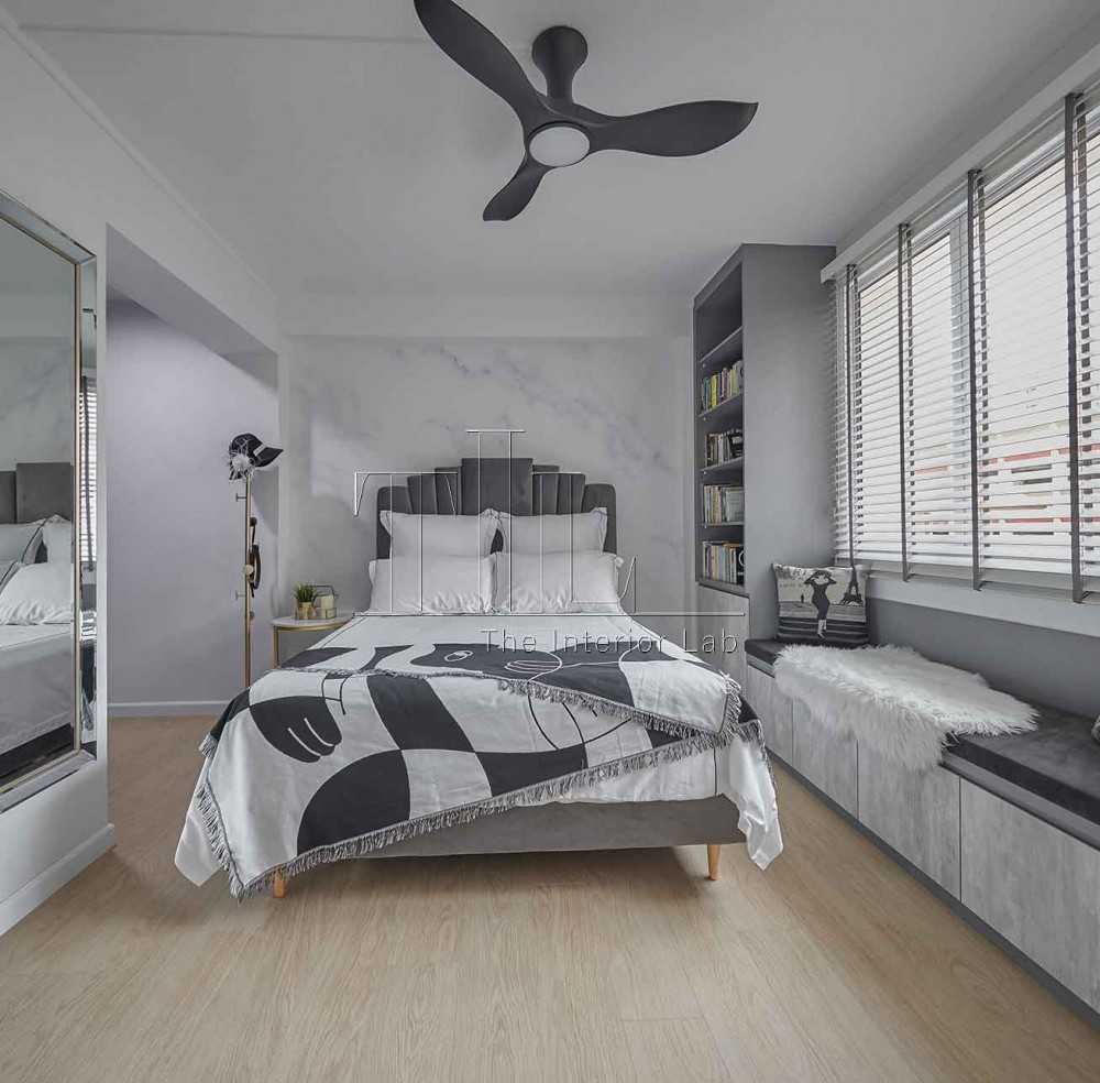 Contemporary Bedroom with Bookshelf and Wood Flooring