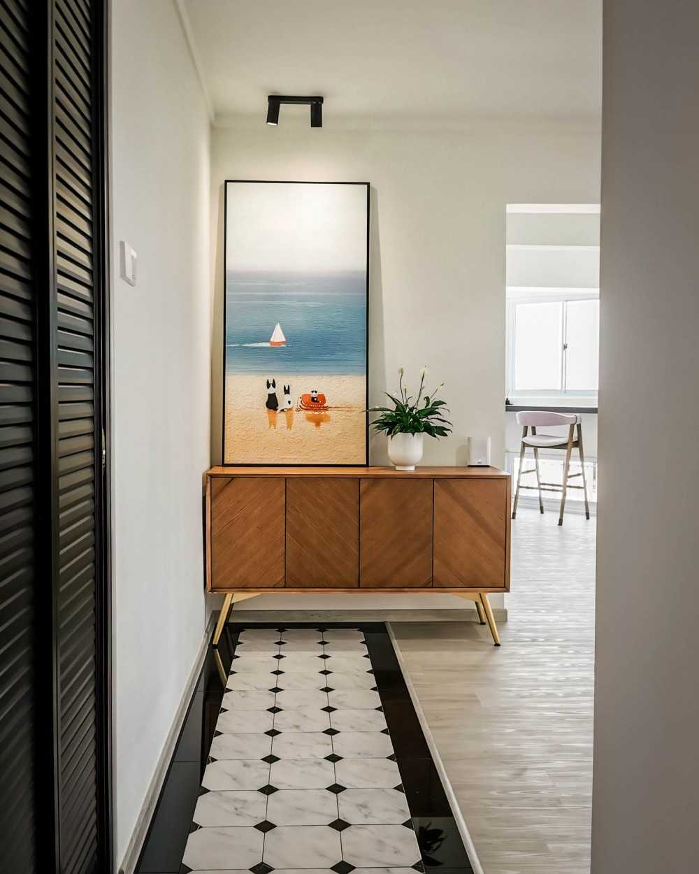 Contemporary Entryway with Artwork and Display Cabinets