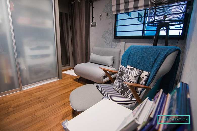 Modern Bedroom with Bookshelf and Parquet Floor