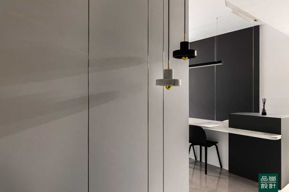 Modern Foyer with Marble Floor and Feature Wall
