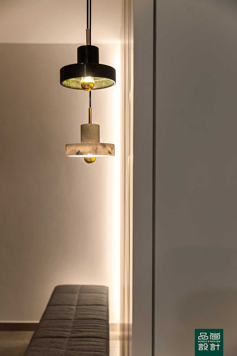 Modern Foyer with Cove Lighting and Seating Bench