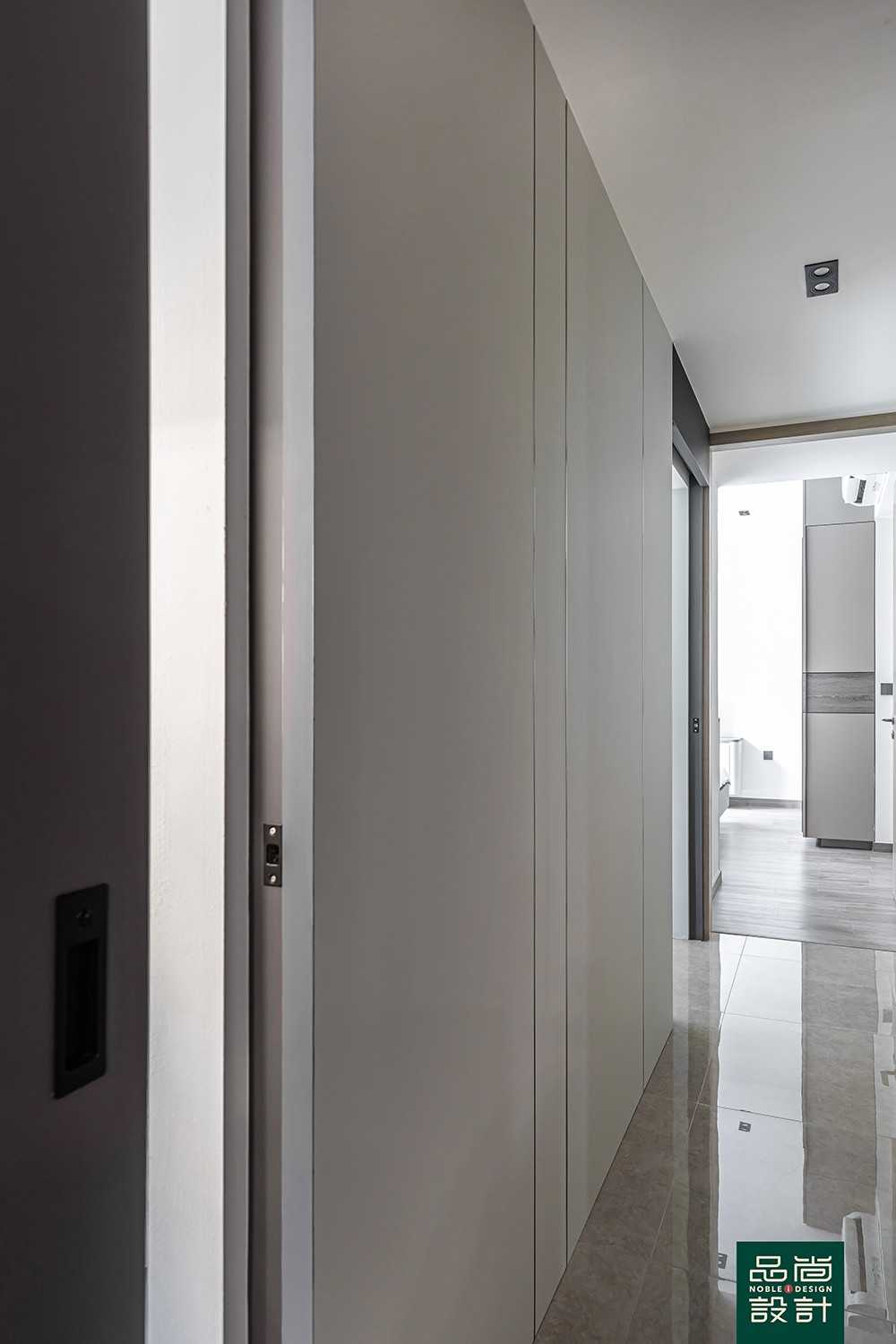 Modern Hallway with Marble Floor and Feature Wall