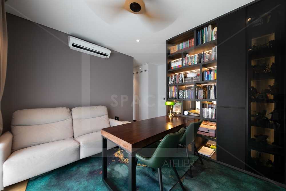 Contemporary Home Office with Bookshelf and Desk